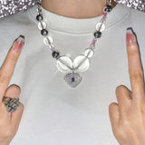 AUDREY NUNA x NUNCHI LOCKET NECKLACE-nunchi