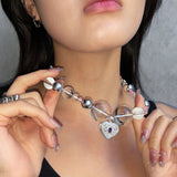 AUDREY NUNA x NUNCHI LOCKET NECKLACE-nunchi