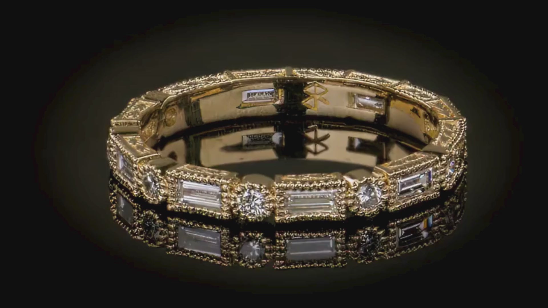 Milgrain art deco style alternating baguette and round diamond eternity band rotating. 